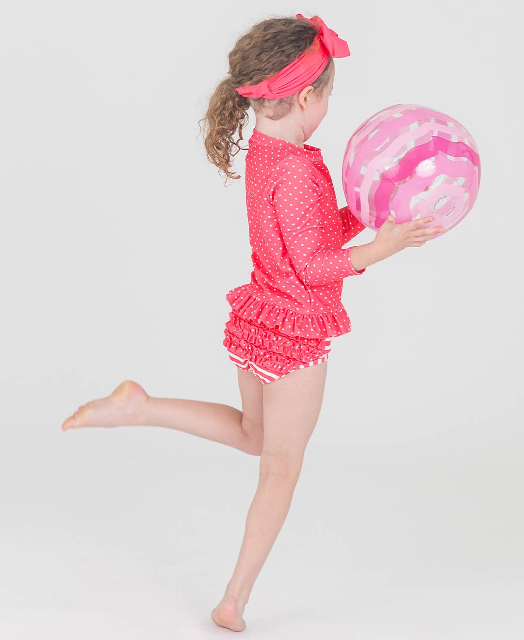RuffleButts + RuggedButts - Girls Hot Pink Heart Polka Dot Long Sleeve Rash Guard 2-Piece Swimsuit with Signature Rear Ruffles