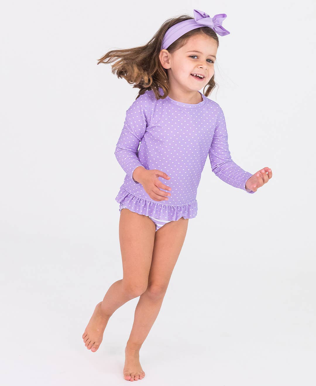 RuffleButts + RuggedButts - Girls Lavender Heart Polka Dot Long Sleeve Rash Guard 2-Piece Swimsuit with Signature Rear Ruffles