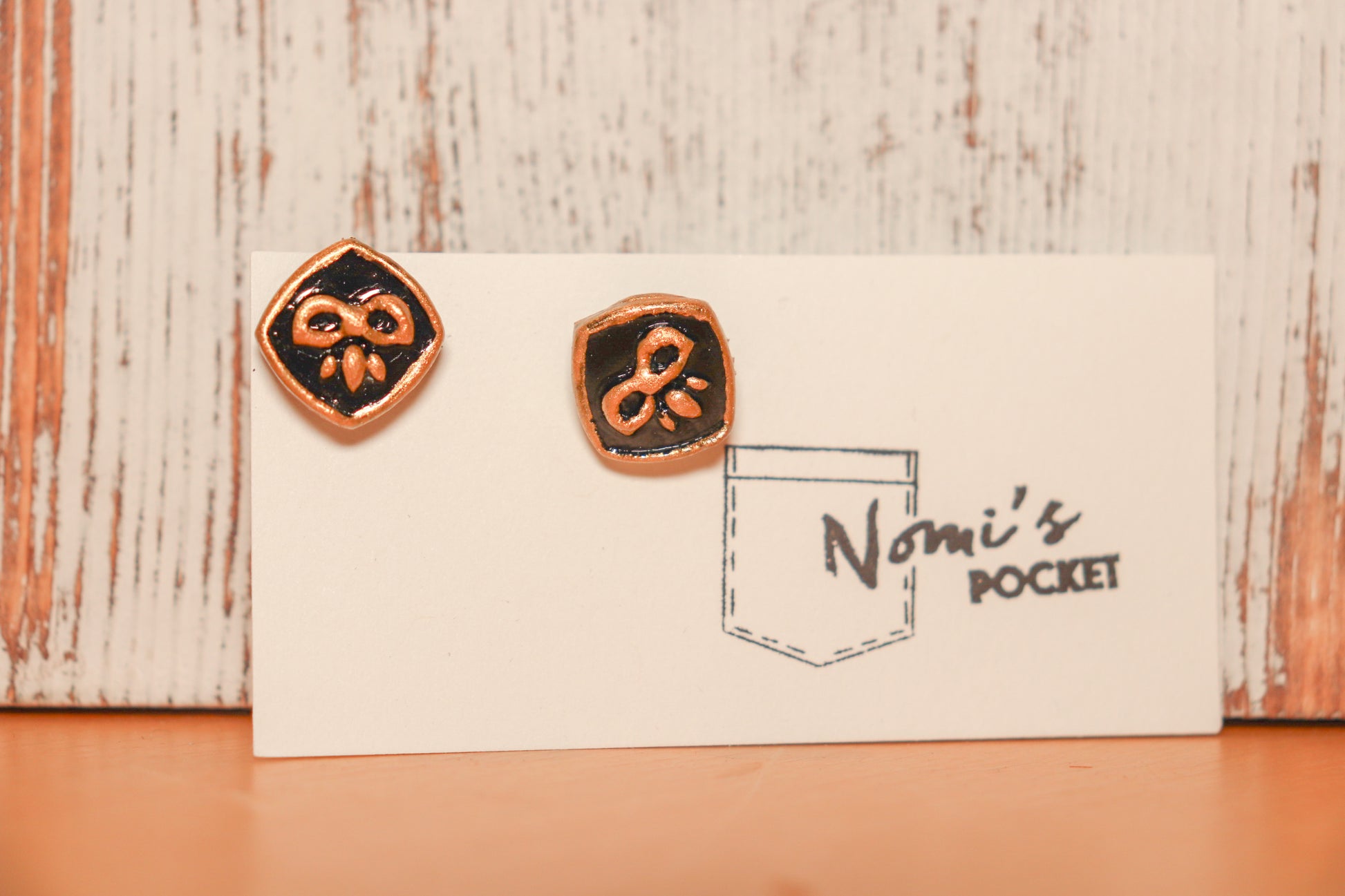 Black and gold Mardi Gras handmade clay earrings by Nomi’s Pocket