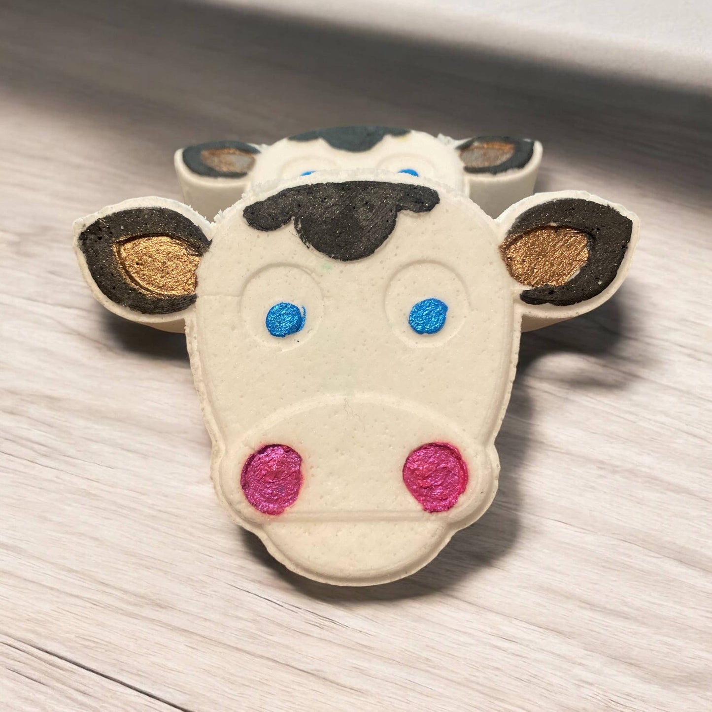 Hand Painted Cow Bath Bomb with surprise coin inside 